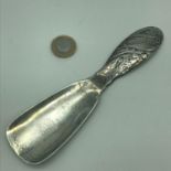 A Sterling silver Tiffany & Co Art Nouveau shoe horn, Measures 17.1cm in length