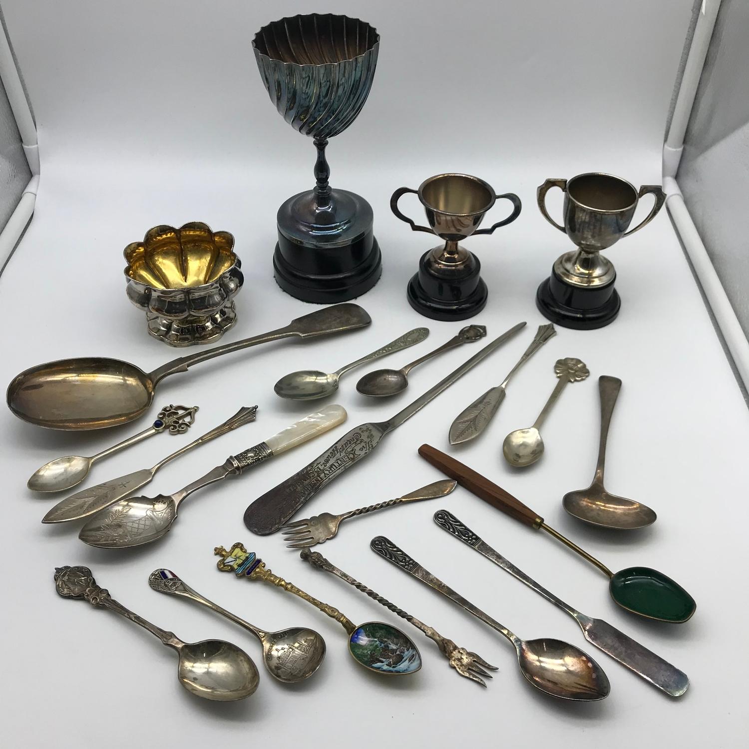 A Lot of silver plated and E.P. spoons, letter opener and 3 various sized trophies