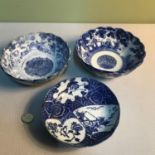 Three 19th century Chinese blue and white bowls. One measures 15.5cm in diameter