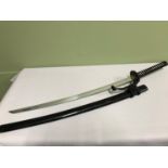 A 20th century Samurai sword, Lacquered Saya scabbard, Metal bronzed Tsuba, Removable Tsuka (Handle)