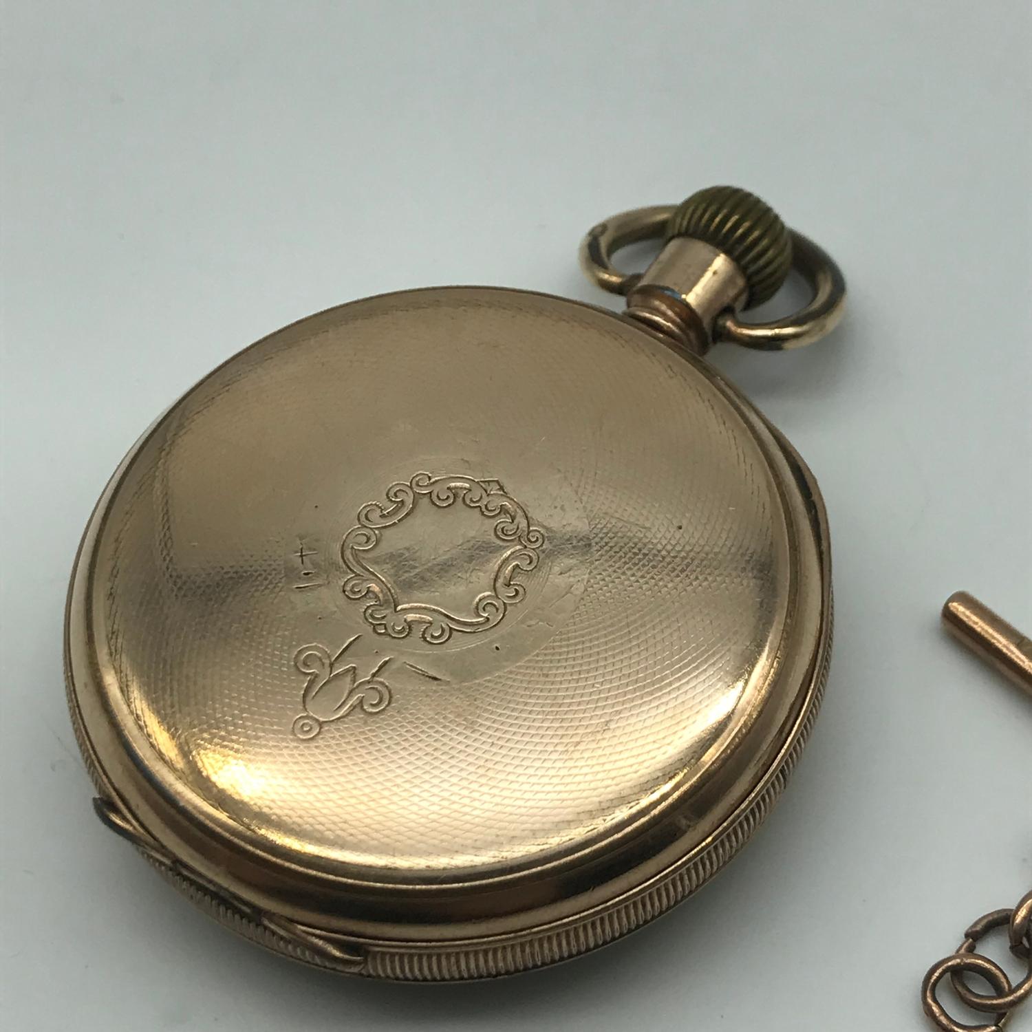 A gold plated 15 jewel lever pocket watch, in a working condition, together with a 9ct gold T-bar - Image 2 of 3