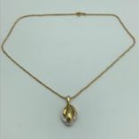 An 18ct gold and diamond pendant with an 18ct gold necklace, weighs 6.23grams