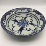 A Large pottery blue and white design fruit bowl, Measures 28cm in diameter