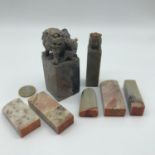 A Lot of seven 19th century Soapstone Japanese/ Chinese seals, Two have carved foo dogs to the tops.