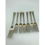 A Set of 6 Georgian London silver starter forks with Georgian London silver dinner fork. Maker of