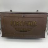 A Vintage First-Aid Minimax tin cabinet