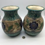 A Pair of Art Deco Austria Amphora floral design vases, Impressed to the base. Measure 20.5cm in