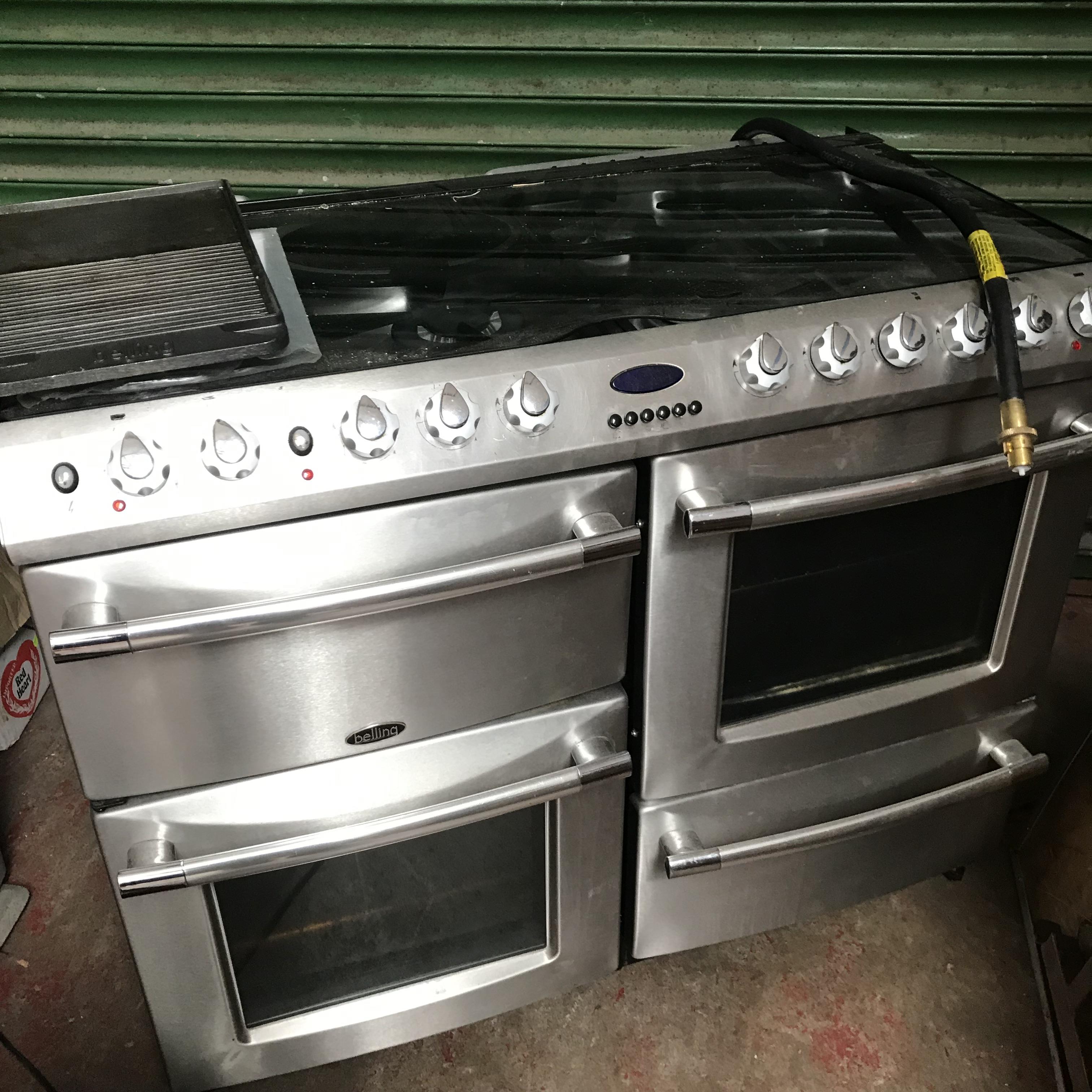 Belling dual fuel cooker (gas) stainless steel front, glass lift top, instructions and comes with Be