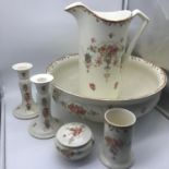 A Victorian floral design 6 piece dressing table and washing set. Consists of Water jug, bowl,