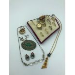 A Lot of vintage jewellery which includes Spanish boat brooch, Various sized rings & earrings