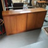 A Retro teak 4 door bookcase.