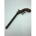 A Victorian antique long barrel pistol, missing a pin to keep it together. barrel measures 22.2cm