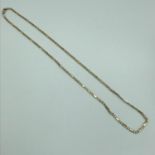 A 9ct gold Figaro necklace, measures 59cm in length, weighs 11.47grams