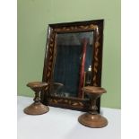 An Arts and crafts inlaid framed mirror together with two solid oak pedestal stands