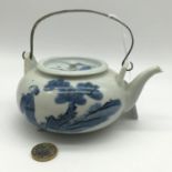 Early 19th century Chinese saki tea pot with white metal handle, Sat upon 3 bun feet, Hand painted