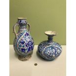 A Lot of two antique blue and white hand painted Persian vases, vessels. Tallest measures 34.5cm