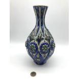 A 19th century/ Early 20th century porcelain vase, designed with floral enamel design, Stamped to