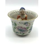 An Unusual Mid 19th century Famille Rose wine cup, fitted with a ceramic Chinese God figurine to the