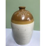 A Large A.W.Buchan & Co Portobello stone ware flagon, Stamped with Arthur Bell & Son Ltd. Estd.