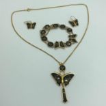 A 1940'S/ 50'S Damascene K24 Stamped Japanese jewellery. Consists of necklace, earrings and bracelet