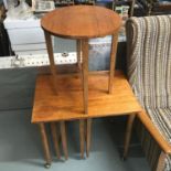 A Retro teak table with 3 pull out swivel folding tables.