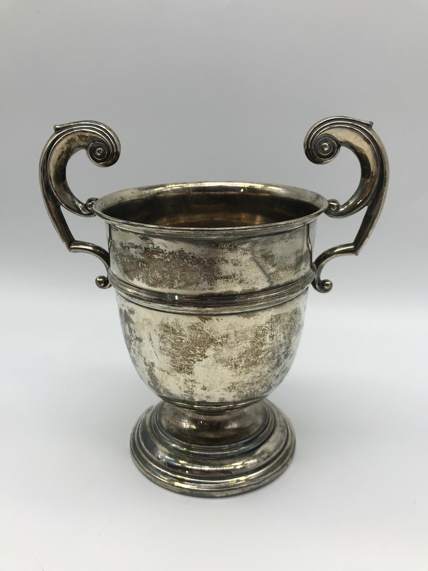 A Birmingham silver two handle trophy, Maker Joseph Gloster Ltd, Measures 16cm in height. weighs 218 - Image 2 of 2