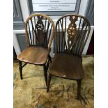 A Lot of two Victorian wheel back elm wood chairs.