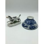 An old Staffordshire running dog figure & Oriental blue and white landscape scene bowl.