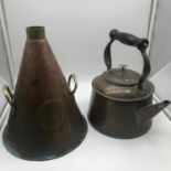 A Vintage copper kettle together with a vintage Copper and brass handle pourer/ funnel marked with