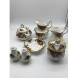 A Lot of Royal Albert old country roses porcelain wares which includes two preserve pots, sugar