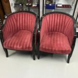 A Pair of contemporary bedroom tub chairs.