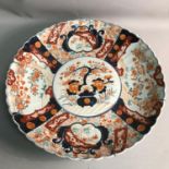 A late 19th/ Early 20th century large Japanese Imari hand painted scalloped edge wall charger,