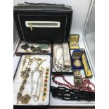 A Selection of vintage costume jewellery to include cameos, brooches, bracelets and necklaces