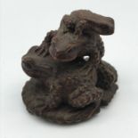 A 19th century Japanese hand carved Toad family, Highly detailed, makers name to the base, Carved