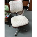 An Industrial swivel chair made by Tansad July 1973. Recovered.
