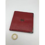 Asprey of London red leather wallet with London silver corners and initials GH to the centre of