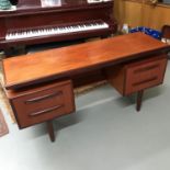 A Retro G-Plan, E-Gomme pedestal legged desk, dressing table. Measures 73145x46cm