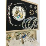 A Quantity of vintage costume jewellery, religious pendants and various modern carded earrings.