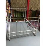 A Victorian double cast iron bed frame.