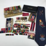 A Collection of military medals, Includes M.B.E MEDAL, WW2 STAR, THE FRANCE & GERMANY STAR, THE