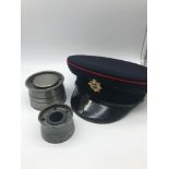 Two antique pewter naval ink pots together with military cap.