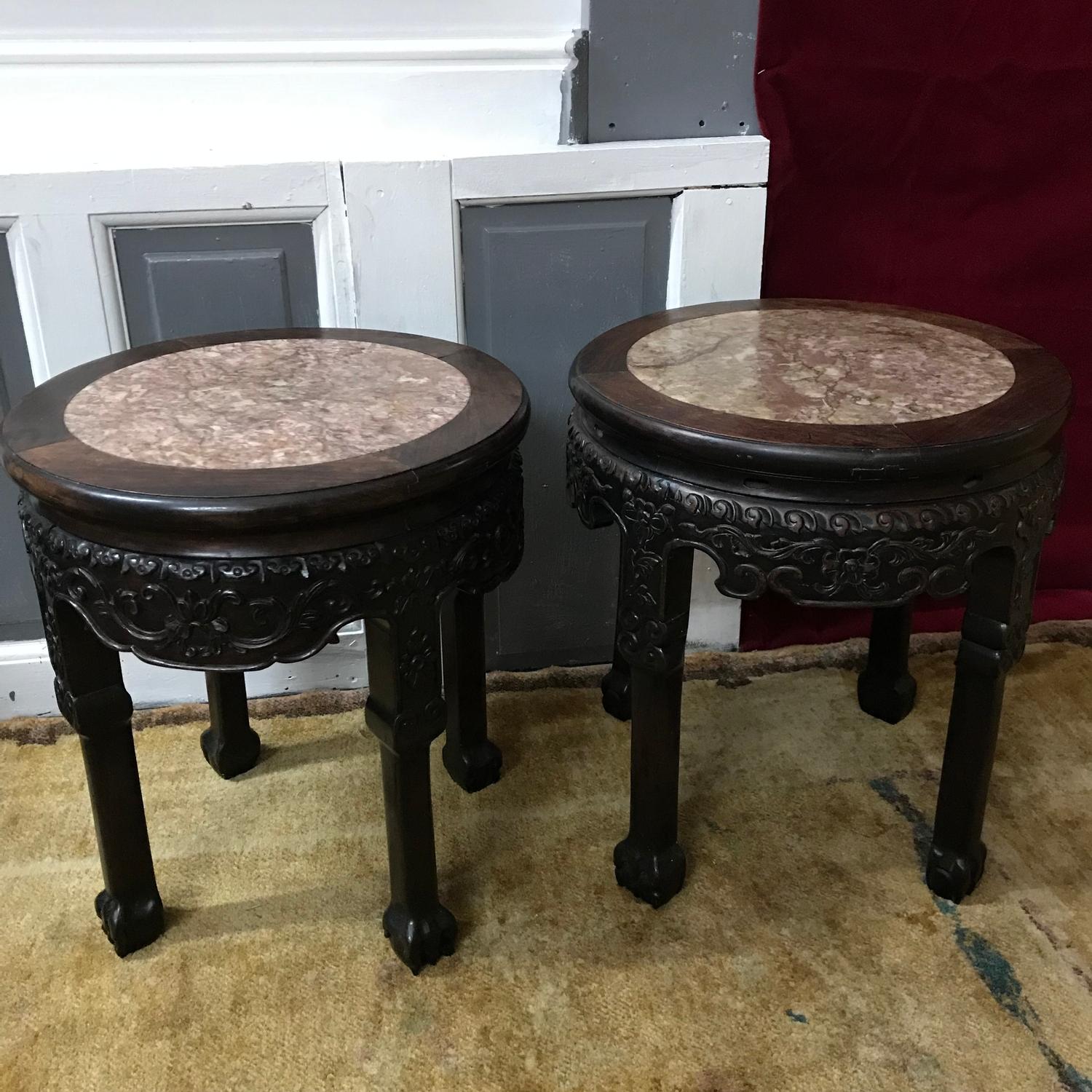 A Pair of 18th/ 19th century oriental hand carved darkwood pedestal stand tables, designed with