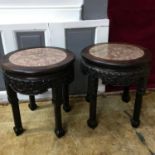 A Pair of 18th/ 19th century oriental hand carved darkwood pedestal stand tables, designed with