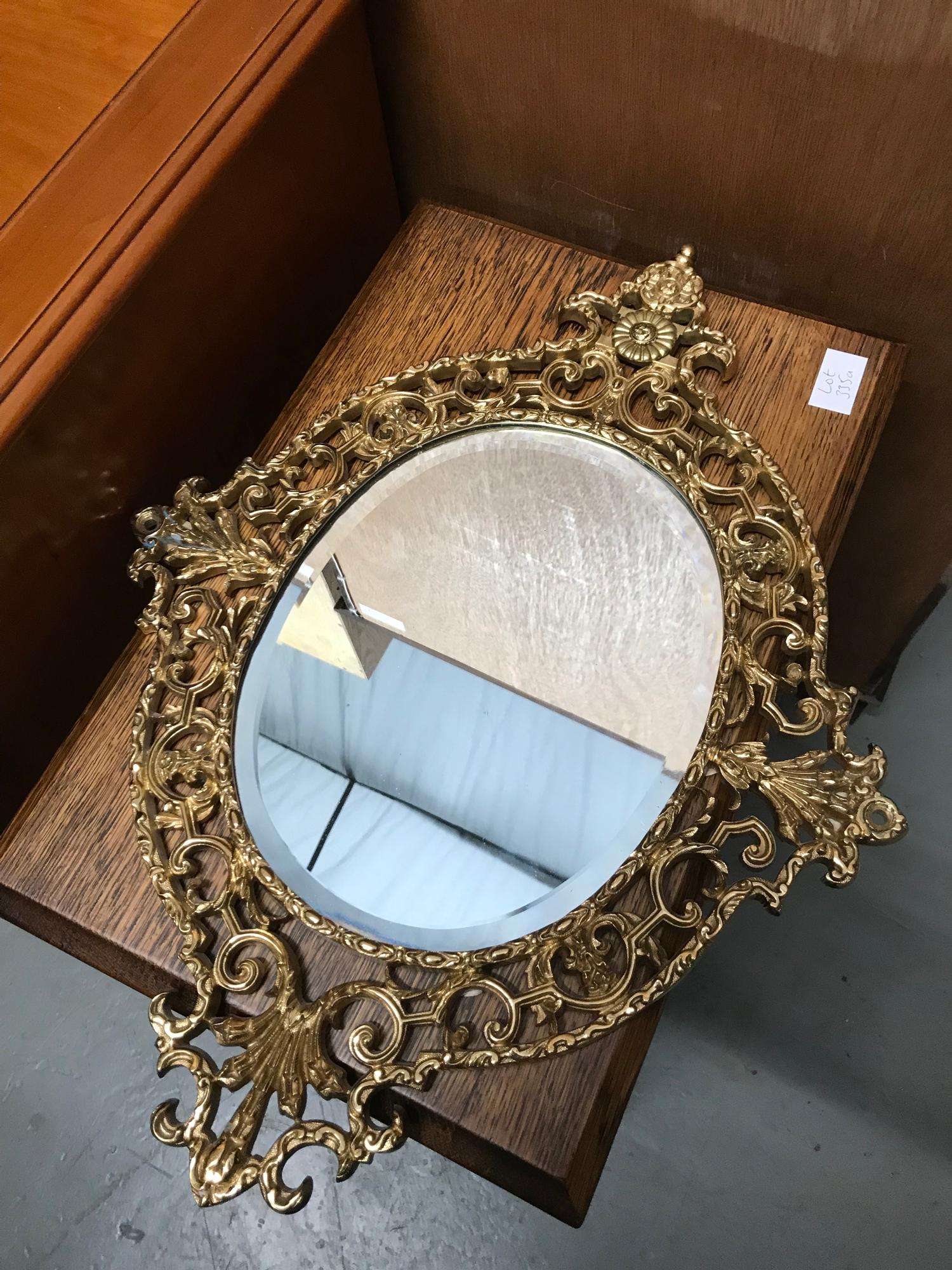 Antique solid gilt brass ornate framed mirror. Measures 52x39cm