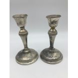 A Pair of Birmingham silver candle sticks, 14cm in height