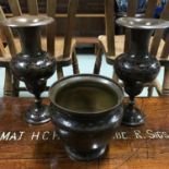 A Pair of Antique Indian bronze vases together with matching planter/ urn. Vase measures 31cm in