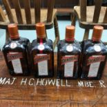 A Lot of four bottlings of 70cl Cointreau, All full and sealed.