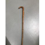 Antique oriental hand carved walking stick, Carved with a locus, leafs and the shaft styled like a