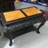 A 19th century Hand carved Chinese console table, designed with two Bur walnut top panels, Highly