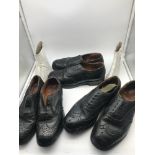 A Lot of three pairs of military brogues, size 5,7 & 7, Together with shoe cuffs